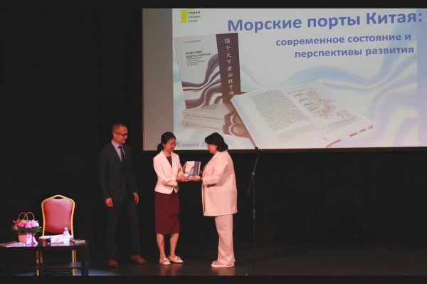 Solemn presentation of the monograph to the Second Secretary of the Chinese Embassy in the Russian Federation, Mr. Liu Yang, and the Attache of the Chinese Embassy in the Russian Federation, Ms. Qiu Ye.