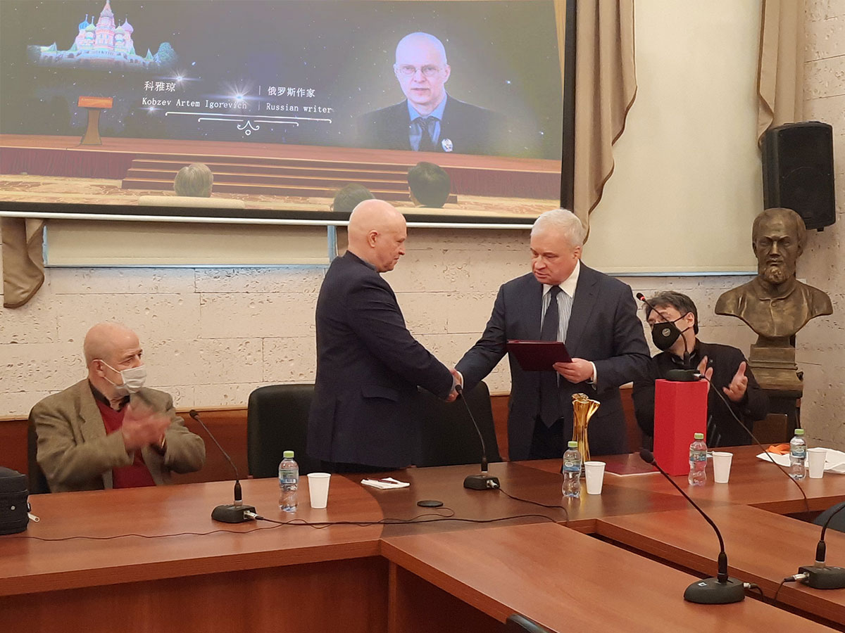 A.I. Denisov, the Russian Ambassador to PRC, Handed Over the National Prize of PRC to A.I. Kobzev, the Head of China Department 